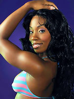 La Starya Ebony in her striped bikini that barely contains her amazing curves